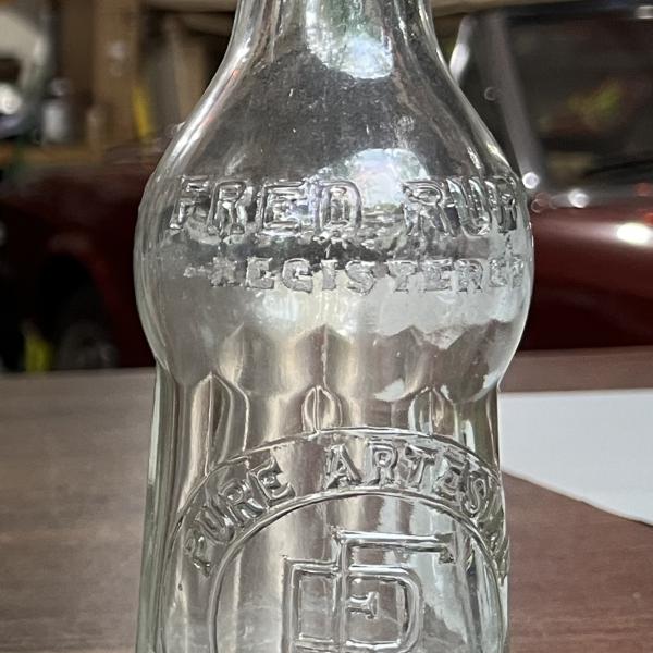 Fred Rupp pure artesian well water bottle
