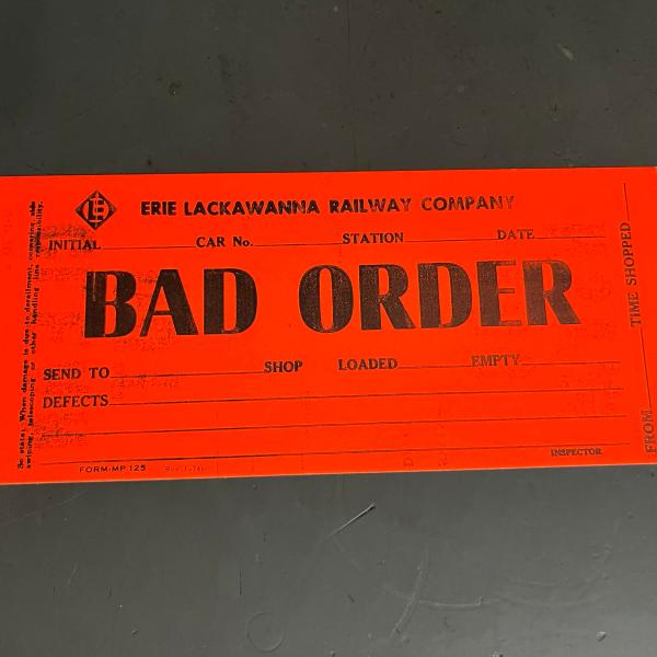Erie Lackawanna bad order tag (orange), January 1974