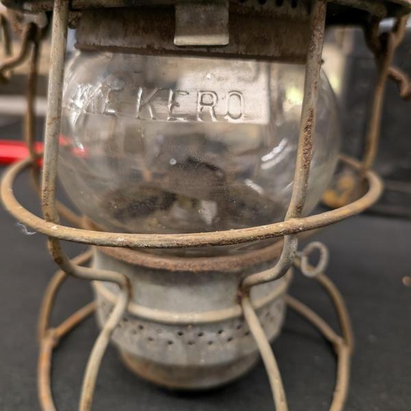 Armspear Manufacturing Co. lantern, marked with Erie diamond and 1925 on top and clear Adlake globe