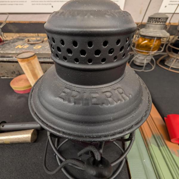 Armspear Manufacturing Co. lantern, painted black, marked Erie R.R. with red cast E.R.R. Co. globe
