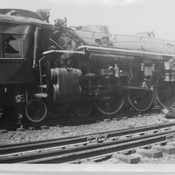 Ziploc bag of assorted black and white railroad photo prints