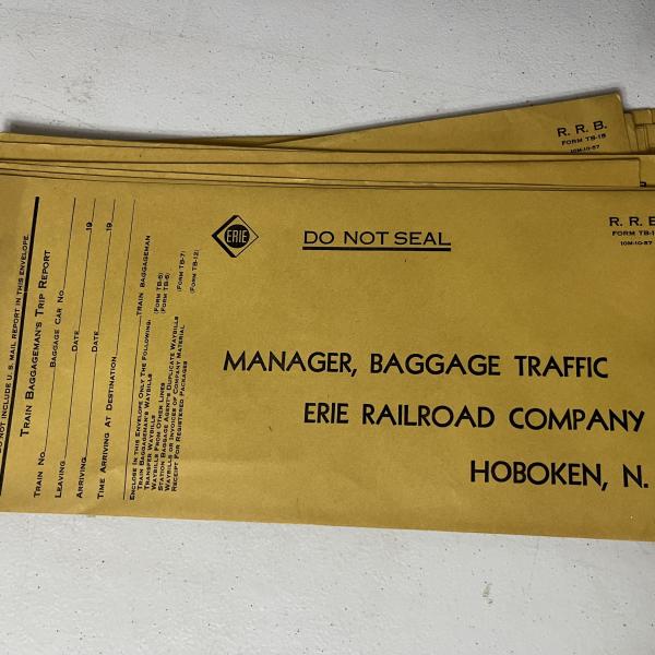 Stack of Erie Railroad manager baggage traffic envelopes, unused, October 1957