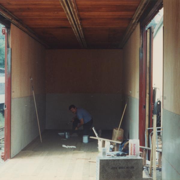 Photograph of interior of Conrail Safety on Rails Theater boxcar 368191 being outfitted at Morristown & Erie Railway Morristown Yard, Morristown, NJ, spring 1992