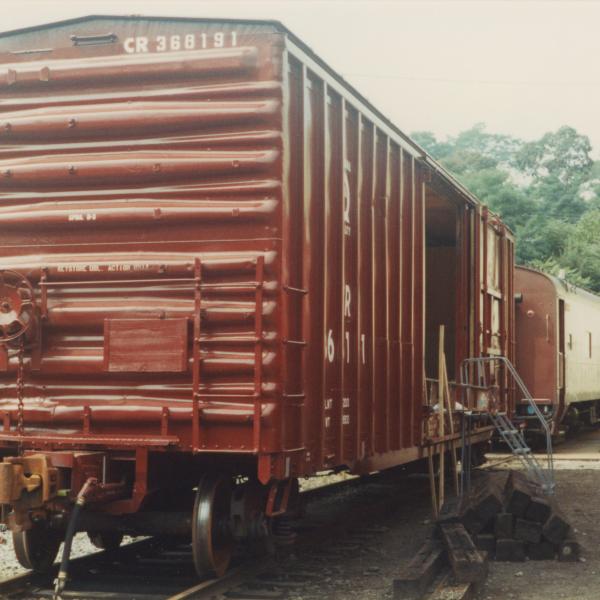 Photograph of exterior of Conrail Safety on Rails Theater boxcar 368191 being outfitted at Morristown & Erie Railway Morristown Yard, Morristown, NJ, spring 1992