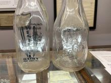 Two milk bottles from Westfall Dairy / C. S. Cooper (one quart bottle and one pint bottle)