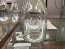 One quart milk bottle from Otisville Dairy / D.W. Lake