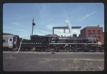 Photograph of Susquehanna 2-8-2 142 stopping for water in Port Jervis, NY, May 21, 1992