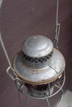 Adlake lantern, marked EL with red unmarked globe