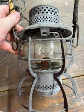 Armspear lantern, marked with Erie diamond on dome and etched Erie diamond on clear globe