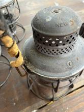 Armspear lantern, marked with Erie diamond on dome and etched Erie diamond on clear globe