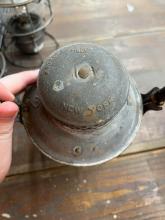 Armspear lantern, marked with Erie diamond on dome and etched Erie diamond on clear globe