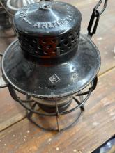 Dressel lantern, painted black, marked with Erie diamond on dome and cast Erie diamond on globe