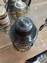 Dressel lantern, painted black, marked with Erie diamond on dome and cast Erie diamond on globe