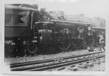 Ziploc bag of assorted black and white railroad photo prints