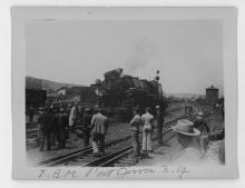 Ziploc bag of assorted black and white railroad photo prints