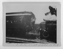 Ziploc bag of assorted black and white railroad photo prints