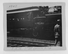 Ziploc bag of assorted black and white railroad photo prints