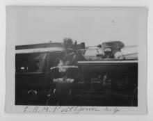 Ziploc bag of assorted black and white railroad photo prints