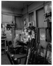 Four photographs of Erie Lackawanna tower operator in Suffern, NY