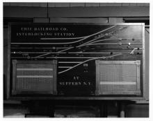 Four photographs of Erie Lackawanna tower operator in Suffern, NY