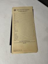 Stack of Erie Railroad passenger train reports, June 1959