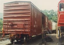 Photograph of exterior of Conrail Safety on Rails Theater boxcar 368191 being outfitted at Morristown & Erie Railway Morristown Yard, Morristown, NJ, spring 1992